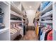 Walk-in closet with ample storage space featuring organized shelves and hanging rods at 1415 Isabell St, Golden, CO 80401