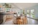 Bright kitchen featuring an island, wood stools, and lots of natural light at 1415 Isabell St, Golden, CO 80401