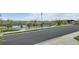 Community street view features a park and green space with a tennis court at 12930 Bobcat Ct, Broomfield, CO 80021