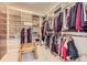 Large walk-in closet with custom shelving and ample storage space for clothing and accessories at 12930 Bobcat Ct, Broomfield, CO 80021