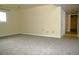 Finished basement with neutral paint and carpet at 1008 Park View Ct, Castle Rock, CO 80104