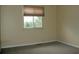 Bedroom with carpet, window, and neutral walls at 1008 Park View Ct, Castle Rock, CO 80104