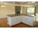Stylish kitchen island boasts sleek countertops and ample storage space, perfect for modern living and entertaining at 1008 Park View Ct, Castle Rock, CO 80104