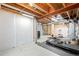 This unfinished basement space allows for lots of room for storage and has an exercise area at 3748 Oakwood Dr, Longmont, CO 80503