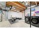 Unfinished basement area with a utility area and space for exercise equipment, and laundry area at 3748 Oakwood Dr, Longmont, CO 80503