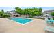 Community pool with ample seating, well-maintained and ready for relaxing summer days at 3748 Oakwood Dr, Longmont, CO 80503