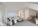 Cozy living room with plush seating, modern décor, and ample natural light at 2332 W Baltic Pl, Englewood, CO 80110