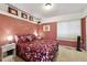 Comfortable bedroom with charming decorations and a window allowing natural light at 4819 Jericho Ct, Denver, CO 80249
