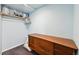 Walk-in closet offering ample storage with a dresser and organizational solutions at 4819 Jericho Ct, Denver, CO 80249