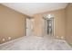 Neutral bedroom with carpet, neutral paint, and ensuite half bathroom at 4605 S Yosemite St # 36, Denver, CO 80237
