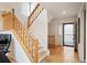 Bright entryway features wood floors, a staircase, and access to multiple rooms at 4605 S Yosemite St # 36, Denver, CO 80237