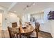 Dining area with hardwood floors that leads to the kitchen at 4555 S Auckland Ct, Aurora, CO 80015