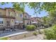 View of an attractive home with front yard, patio area, and desert landscaping at 4555 S Auckland Ct, Aurora, CO 80015