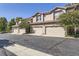 Well-maintained townhomes with attached garages and beautiful exterior features at 4555 S Auckland Ct, Aurora, CO 80015