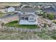 Aerial view of the property showcasing the large backyard and surrounding neighborhood at 5641 Echo Hollow St, Castle Rock, CO 80104