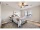 Cozy bedroom with plush carpet, a window view, and neutral decor at 5641 Echo Hollow St, Castle Rock, CO 80104