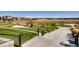 Scenic view of a well-maintained community park with walking paths, grassy areas, and landscaping for outdoor enjoyment at 5641 Echo Hollow St, Castle Rock, CO 80104