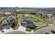 Stunning two-story home with a three-car garage and a well-manicured lawn in a Gathering-friendly neighborhood at 5641 Echo Hollow St, Castle Rock, CO 80104