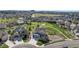 Aerial view of a beautiful two-story home with a spacious driveway and a manicured front yard in a suburban setting at 5641 Echo Hollow St, Castle Rock, CO 80104
