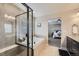 Luxurious main bathroom featuring a soaking tub and adjacent main bedroom view at 5641 Echo Hollow St, Castle Rock, CO 80104