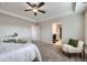 Spacious main bedroom with tray ceiling and ensuite bathroom at 5641 Echo Hollow St, Castle Rock, CO 80104