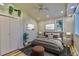 Serene bedroom featuring hardwood floors, a bed, large windows, and recessed lighting fixtures at 26259 Kingsbury Rd, Kittredge, CO 80457