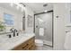 Modern bathroom featuring stylish vanity, sleek shower, and elegant fixtures at 2616 S Leyden St, Denver, CO 80222