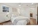 Bright bedroom with stylish decor, hardwood floors, and natural light at 2616 S Leyden St, Denver, CO 80222