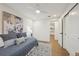 Cozy bedroom with neutral decor, hardwood floors, and natural light at 2616 S Leyden St, Denver, CO 80222
