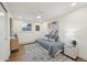 Comfortable bedroom with stylish decor, hardwood floors, and ample natural light at 2616 S Leyden St, Denver, CO 80222