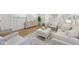 Bright living room with stylish decor, hardwood floors and ample seating at 2616 S Leyden St, Denver, CO 80222