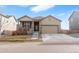 Charming single-story home with a well-maintained front yard and inviting porch at 2342 Shipman St, Brighton, CO 80603
