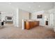 Spacious hallway featuring wooden floors and access to bedrooms at 16403 River Haven Way, Morrison, CO 80465