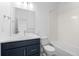 This is a bathroom with a vanity, toilet, and tub-shower combination at 2740 W 68Th Ave, Denver, CO 80221