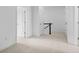 Neutral hallway featuring a staircase and multiple doors at 2740 W 68Th Ave, Denver, CO 80221
