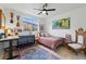 Cozy bedroom features rustic decor, natural light, and vintage accents, creating a unique space at 949 Raleigh St # 2, Denver, CO 80204