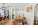 Charming dining room with a wooden table, bench seating, and stylish artwork at 949 Raleigh St # 2, Denver, CO 80204