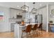 Modern kitchen featuring white cabinets, quartz countertops, and stainless steel appliances at 949 Raleigh St # 2, Denver, CO 80204