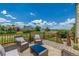 Relax on this back deck with seating and a beautiful view at 5168 Rocky Mountain Dr, Castle Rock, CO 80109