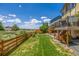 Manicured backyard with a wood fence and picturesque scenery at 5168 Rocky Mountain Dr, Castle Rock, CO 80109
