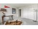 A bedroom with carpet, a desk with a chair, and a double closet with sliding doors at 5168 Rocky Mountain Dr, Castle Rock, CO 80109