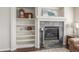 Close up of fireplace with shelving and decor at 5168 Rocky Mountain Dr, Castle Rock, CO 80109
