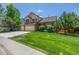 A well maintained home with a large front lawn at 5168 Rocky Mountain Dr, Castle Rock, CO 80109