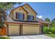A well maintained home with a brick facade and two car garage at 5168 Rocky Mountain Dr, Castle Rock, CO 80109
