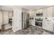Modern kitchen with stainless steel appliances, ample cabinetry, and stylish tile flooring at 5168 Rocky Mountain Dr, Castle Rock, CO 80109