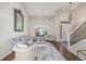 Inviting living room with stylish furniture and plenty of natural light at 5168 Rocky Mountain Dr, Castle Rock, CO 80109