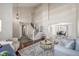Bright and airy living room with high ceilings and a staircase at 5168 Rocky Mountain Dr, Castle Rock, CO 80109