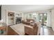 Inviting living room with fireplace, built-in shelving, and ample natural light at 5168 Rocky Mountain Dr, Castle Rock, CO 80109