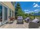 Comfortable patio furniture on an outdoor deck with a sunny sky at 5168 Rocky Mountain Dr, Castle Rock, CO 80109
