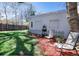 Lush backyard with seating area and garden, creating a serene outdoor space at 1817 - 1821 Vine Vine St, Denver, CO 80206